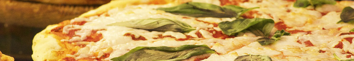 Eating Chicken Wing Italian Pizza at Papa's Pizza Restaurant restaurant in Little River, SC.